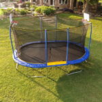 JumpKing 10X15 Oval Trampoline w/ Basketball Hoop JumpKing 10X15 Oval Trampoline w/ Basketball Hoop